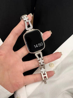 Detailed view of X-shaped links in Apple Watch Band