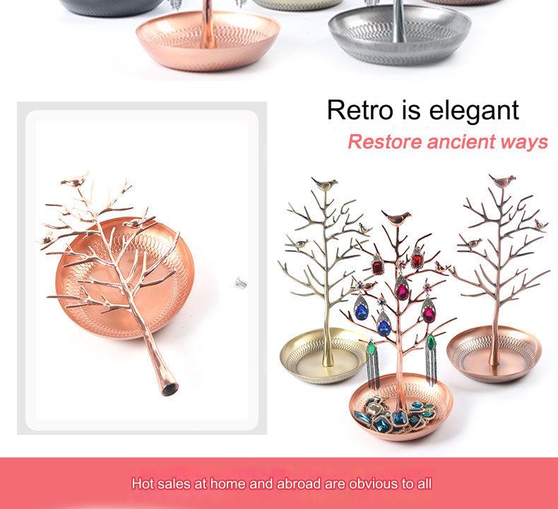 Elegant Bird Tree Jewelry Holder displaying earrings