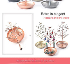 Elegant Bird Tree Jewelry Holder displaying earrings