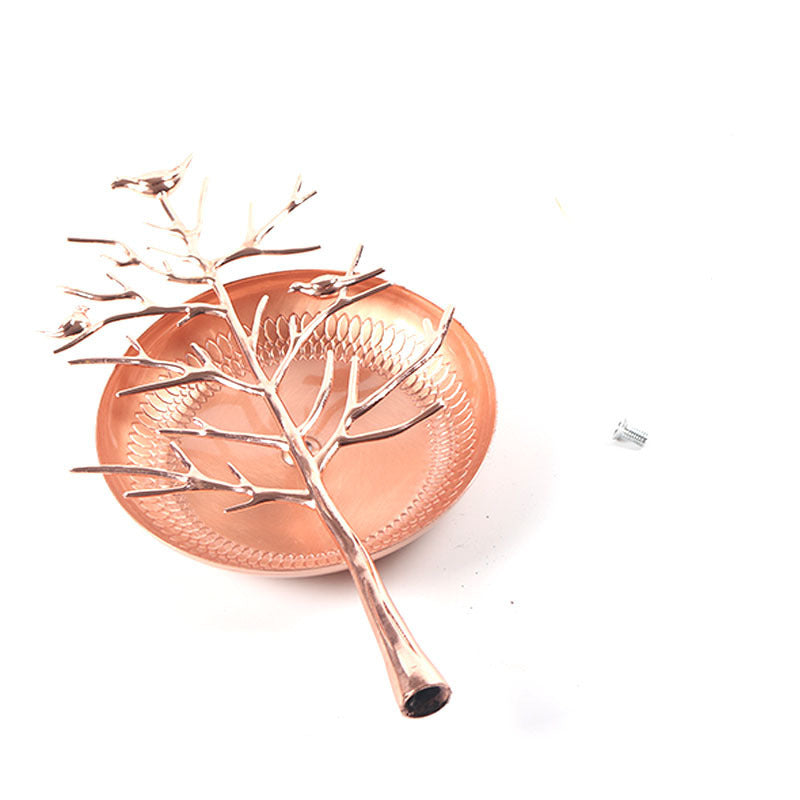 Elegant Bird Tree Jewelry Holder displaying earrings