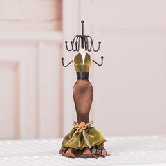 Human-shaped jewelry stand with multiple ornaments