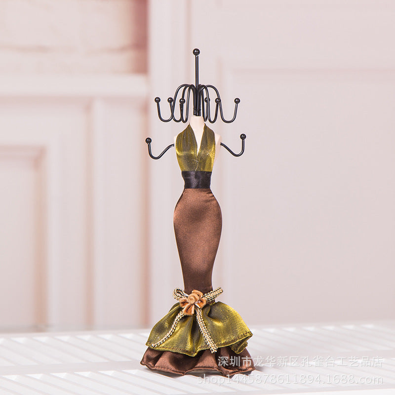 Human-shaped jewelry stand with multiple ornaments