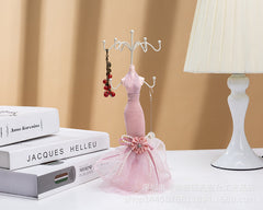 Human-shaped jewelry stand with multiple ornaments