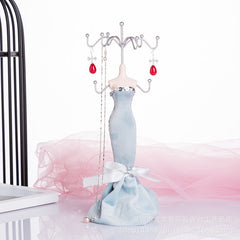 Human-shaped jewelry stand with multiple ornaments