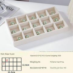 Beige velvet-lined jewelry storage for bracelets
