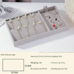 Stylish grey velvet jewelry tray with earrings