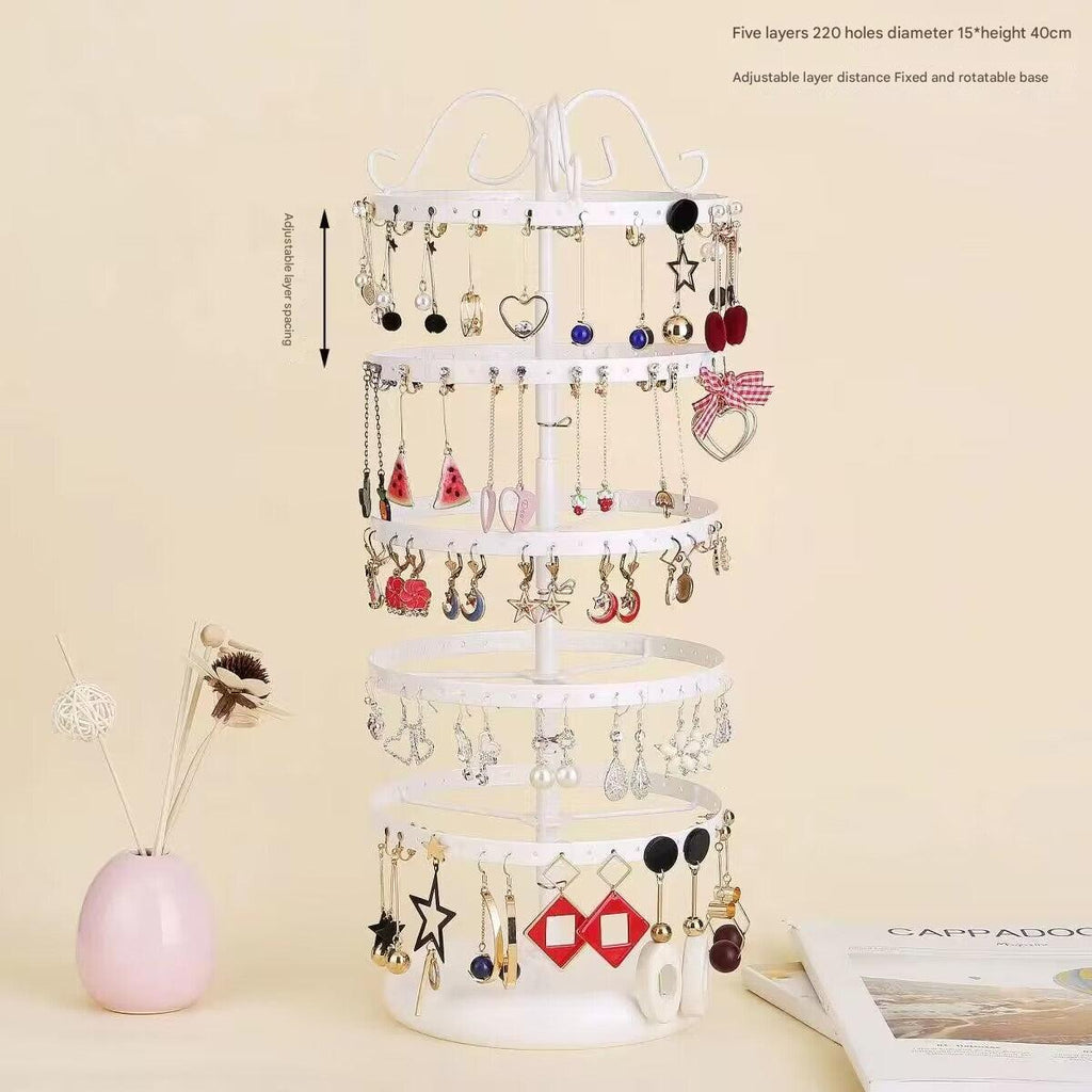 Sleek black and white rotating earring holder
