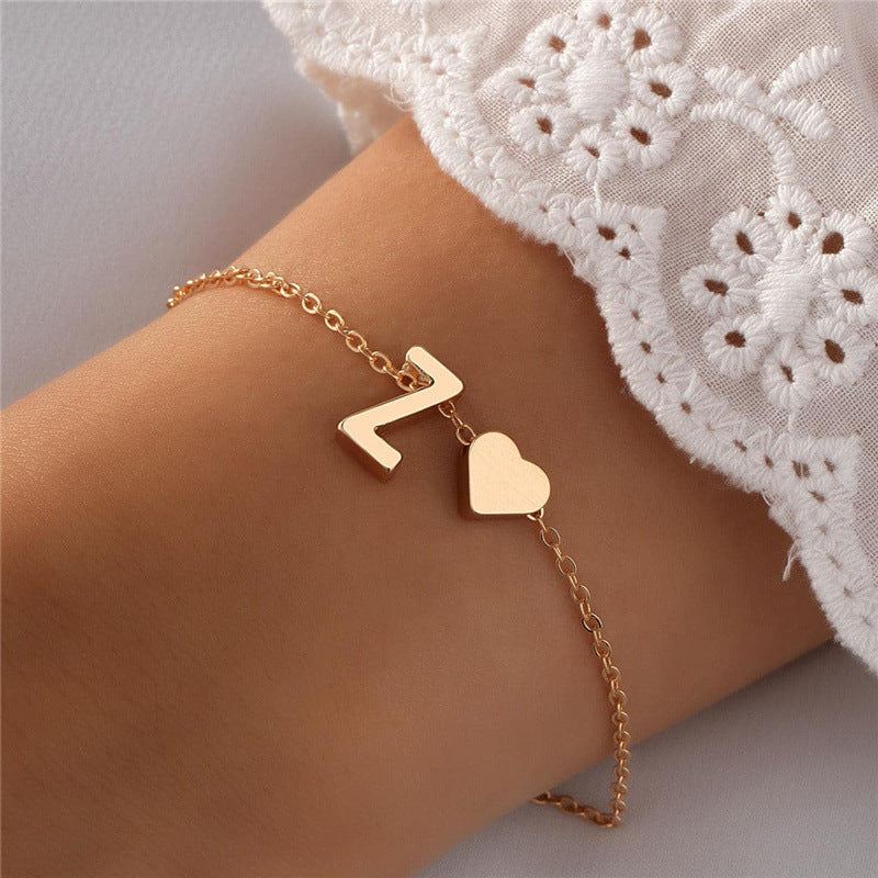 Gold heart-shaped bracelet on display