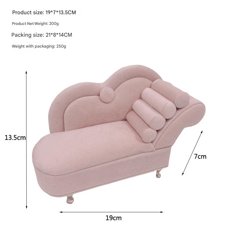 Compact pink velvet vanity for jewellery display