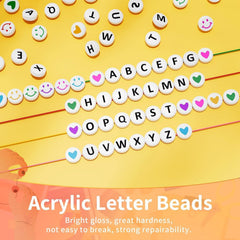 Various coloured heart and smiley face beads from the kit
