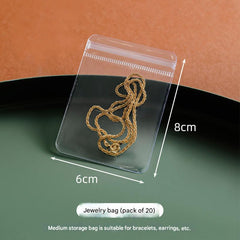 Stylish jewellery organiser featuring clear pouches for rings