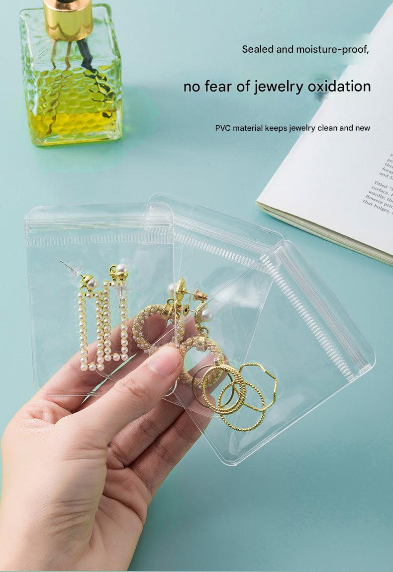 Jewellery organiser displaying rings, earrings and necklaces
