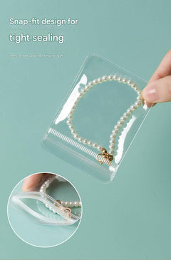 Stylish jewellery organiser featuring clear pouches for rings