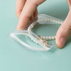 Multi-layer jewellery organiser showing rings and earrings