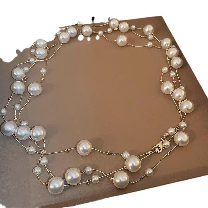 luxurious pearl necklace hanging elegantly
