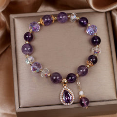 Bracelet with heart pendant showcased