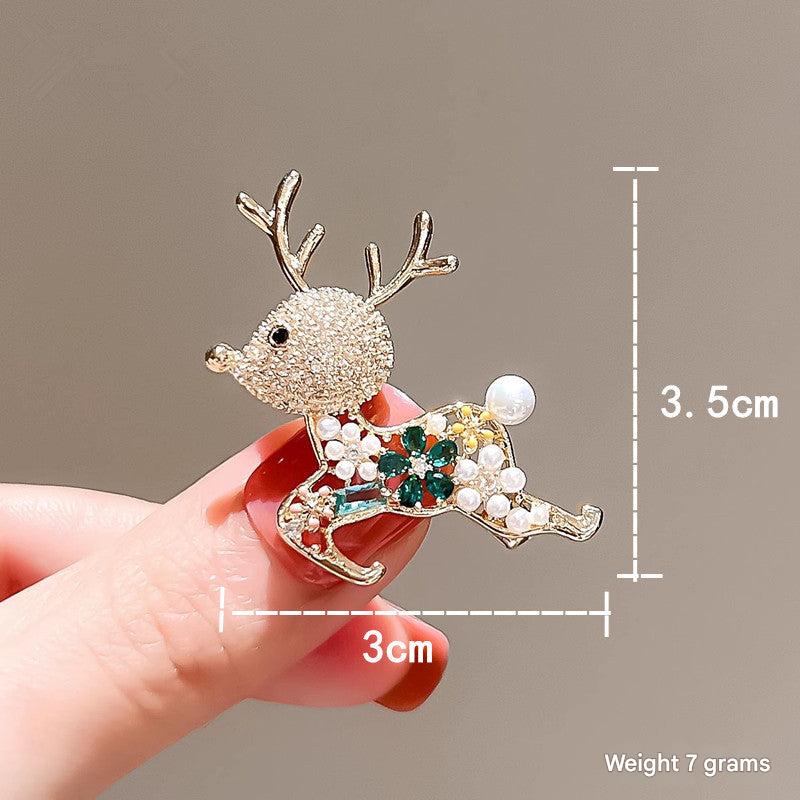 Reindeer Brooch showcased with other jewellery