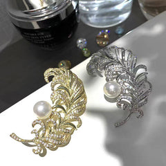 Elegant Gold Brooch on Black Fabric