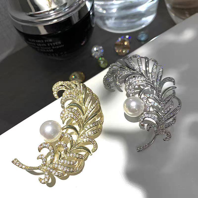Elegant Gold Brooch on Black Fabric
