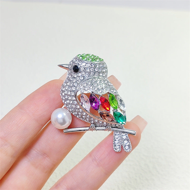 High-Quality Bird Brooch enhancing a jacket