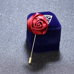 elegant red rose floral brooch on display