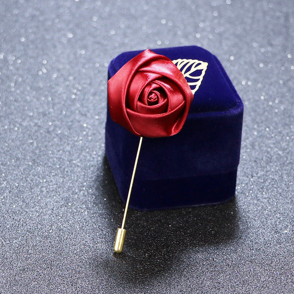elegant red rose floral brooch on display