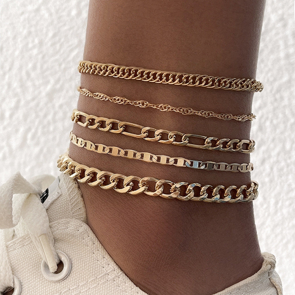Showing the shine and texture of the metal anklet