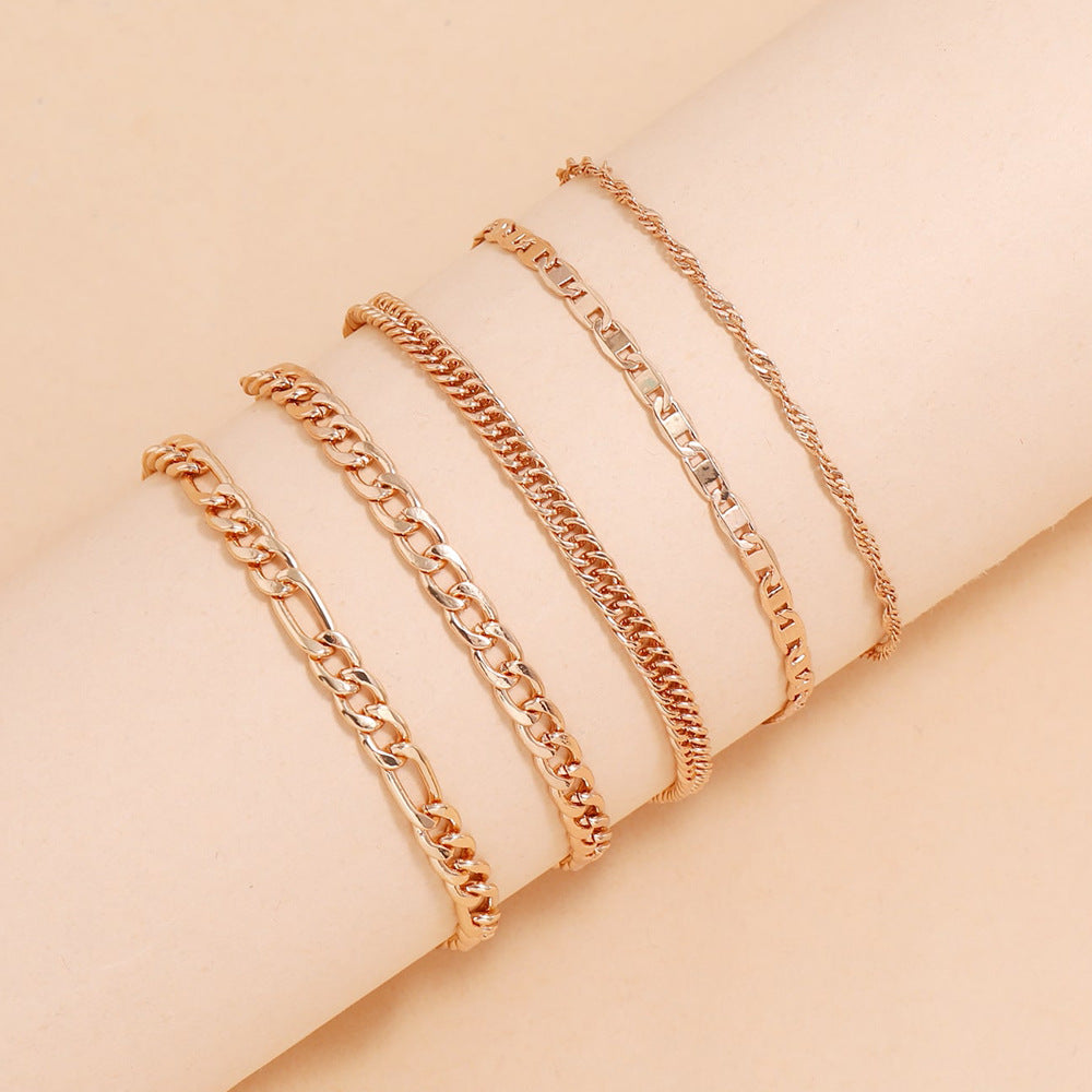 Different angles of a vintage anklet design