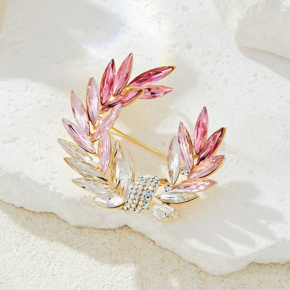 intricate design of moon brooch