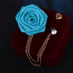 Elegant floral brooch on a wooden background