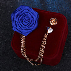 Rhinestone brooch alongside other fashion accessories