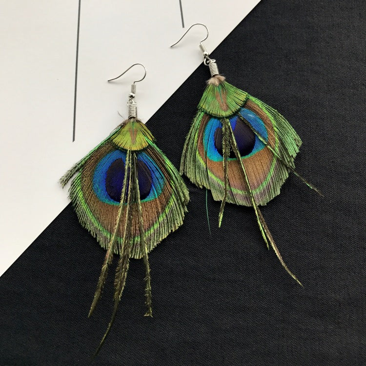 Close-up of bohemian earrings with tassels image 2