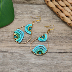 Detailed view of mixed material earrings