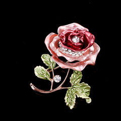 Elegant floral brooch with rhinestones on display