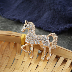 Fashion brooch demonstrating its shine and durability