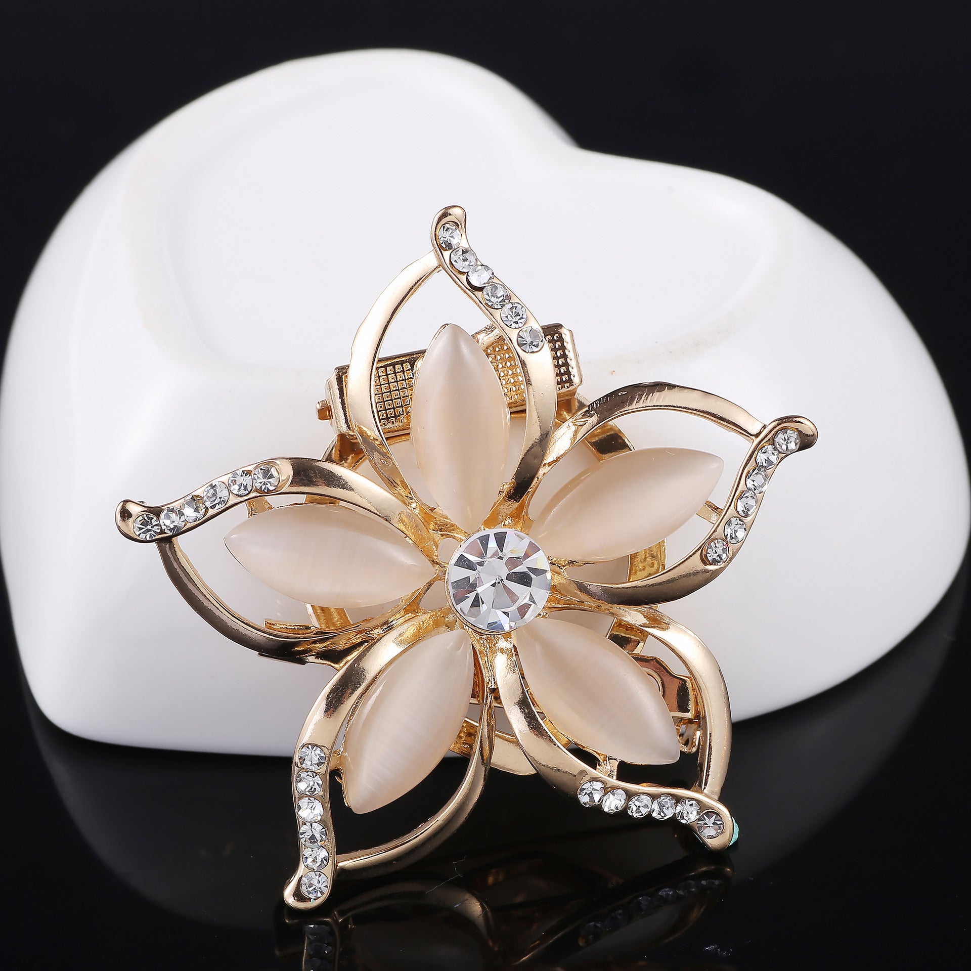 Brooch securing a scarf elegantly