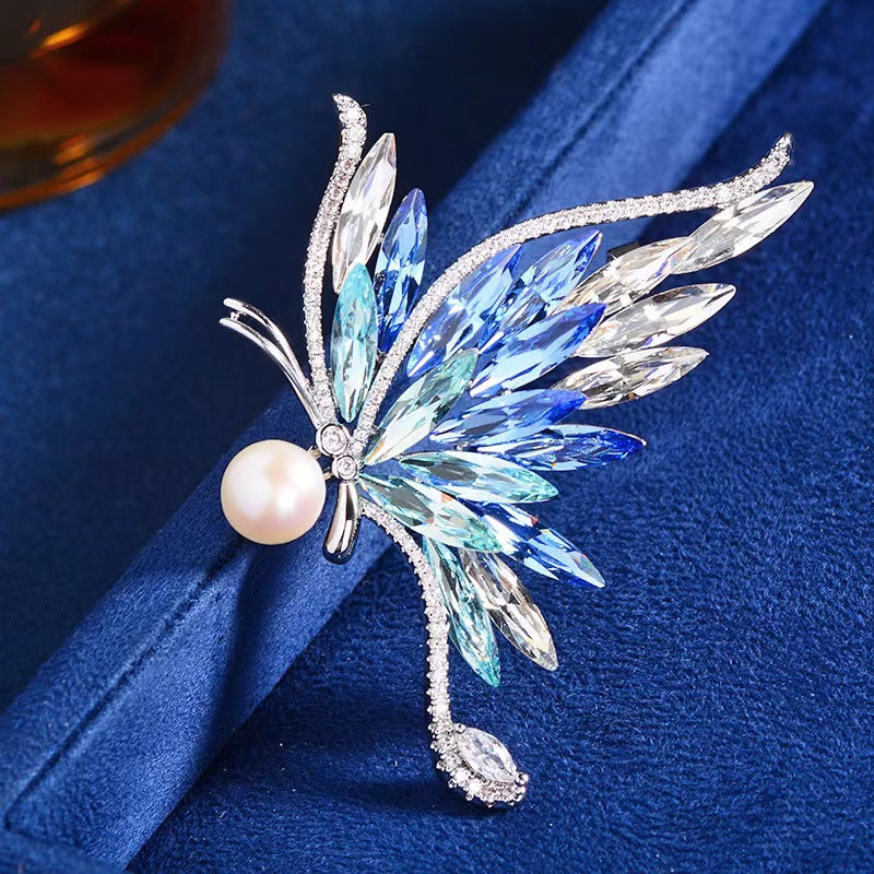 Close up of the elegant butterfly brooch