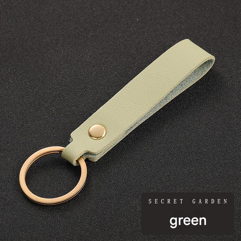 Stylish PU leather keychain against a white background