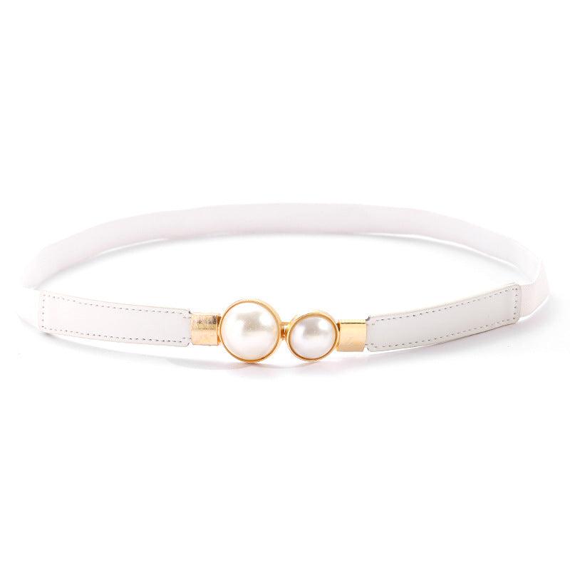 Fashionable women's belt displayed with dress