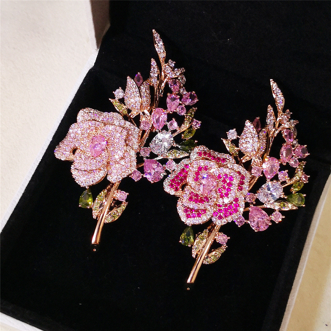 Close-up view of rhinestone details on floral brooch