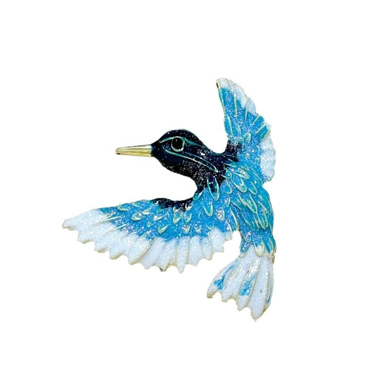 Blue wing bird enamel brooch on jacket