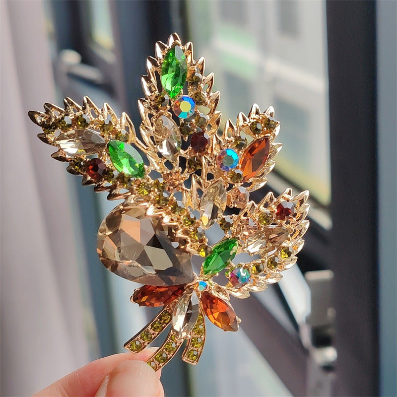 Purple floral brooch on display