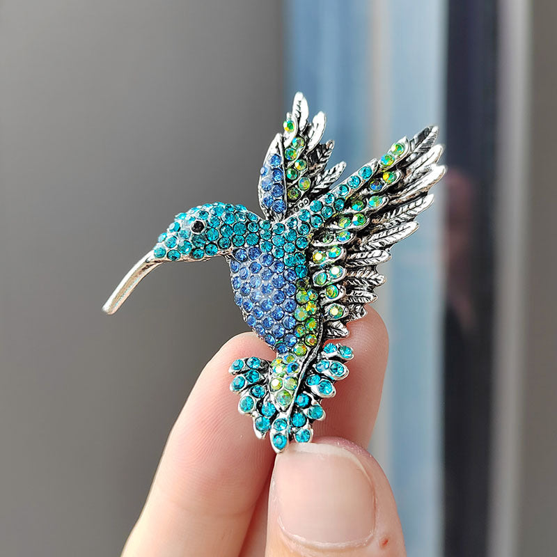 Close-up of Rhinestone Hummingbird Brooch