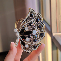 Casual outfit enhanced with butterfly brooch