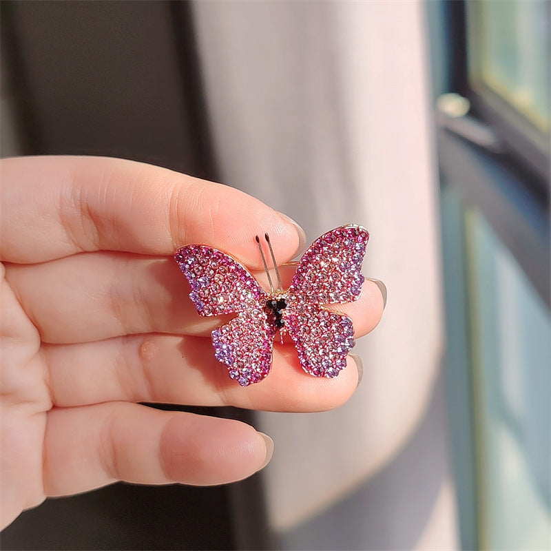 Elegant decorative pin displayed on a sweater