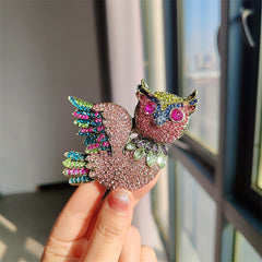 close-up of rhinestone owl detailing