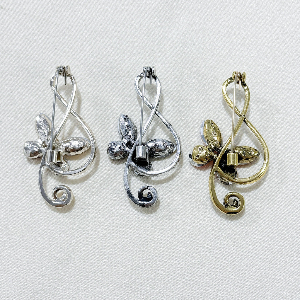 Alloy fashion pin with musical note and butterfly theme