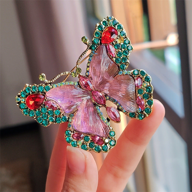 Women wearing butterfly brooch outfit