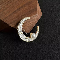dazzling rhinestone brooch display with moon design