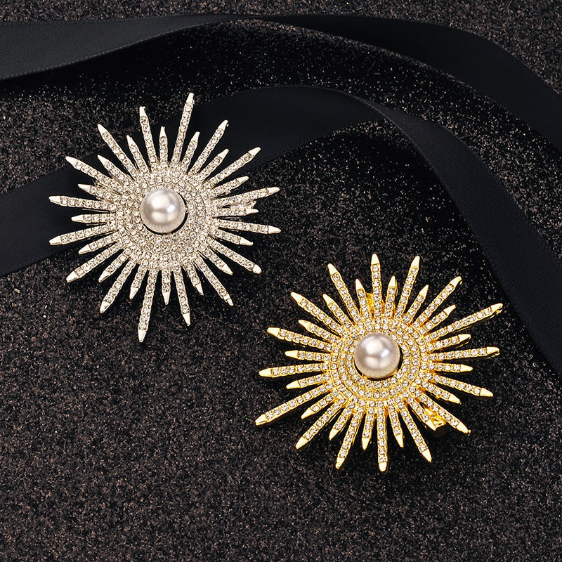 Sunflower brooch displayed on a model's jacket
